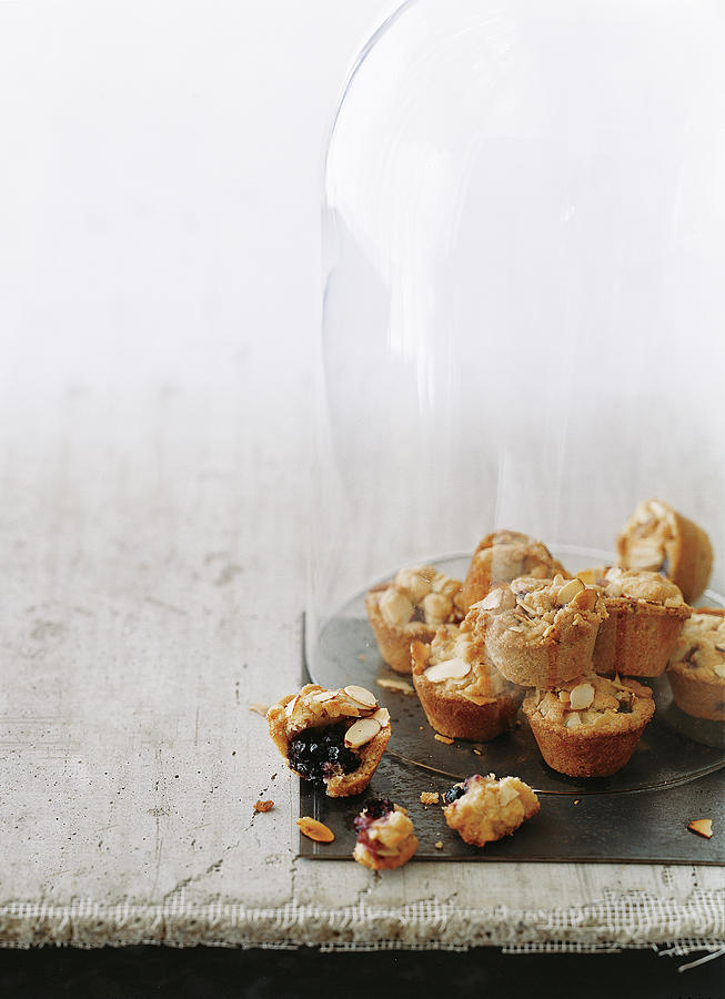 Blueberry Lemon Crumbles In A Glass Cloche Photograph by Romulo Yanes