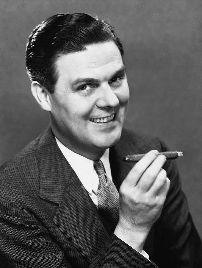 Businessman Smoking Cigar by George Marks