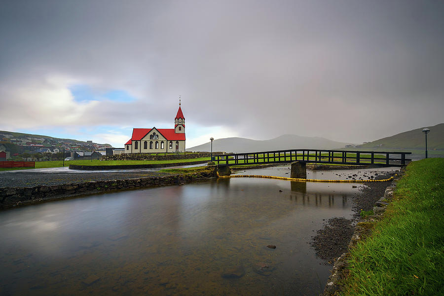Church and the river Stora located in Sandavagur on Faroe Islands, Denmark Photograph by Miroslav Liska