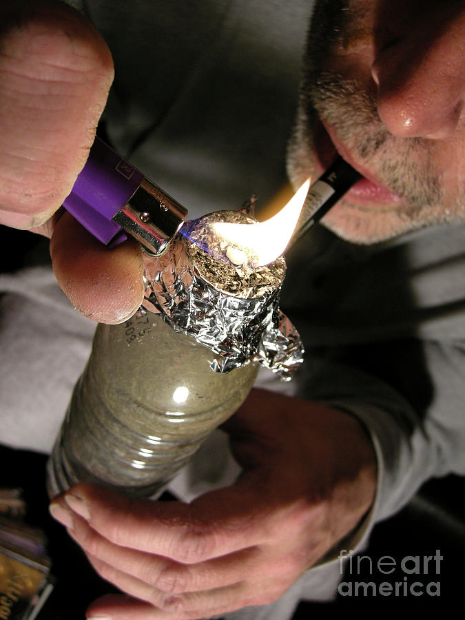 cigarette crack Crack Smoker by Cordelia Molloy / Science Photo Library