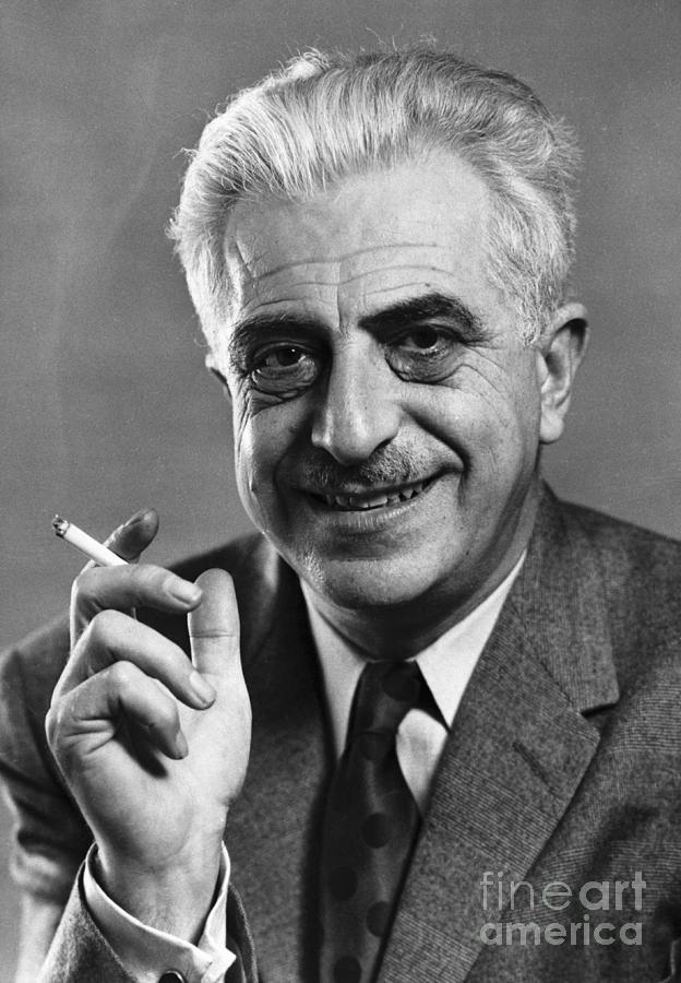 Dr. Gregory Pincus Smoking Cigarette by Bettmann
