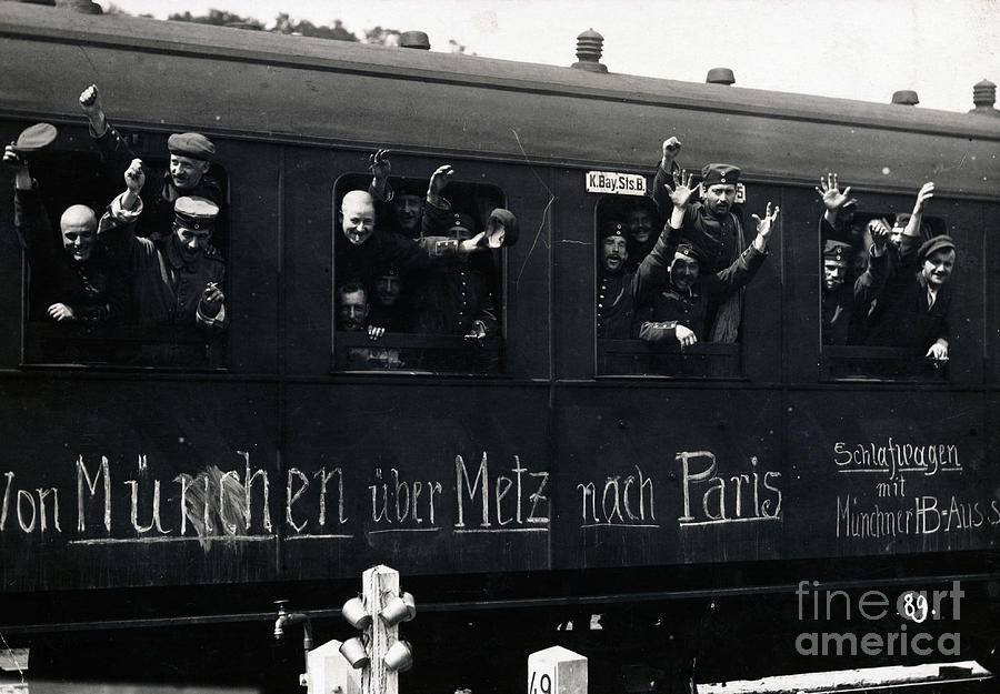 German Troops Waving From Train Windows by Bettmann