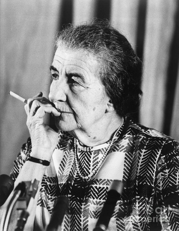 Golda Meir Smoking A Cigarette by Bettmann