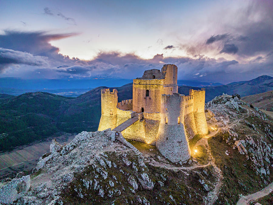 Italy, Abruzzo, Laquila District, Gran Sasso National Park, Calascio, Apennines, Castle And Remains Of Ancient Medieval Village Of Rocca Calascio Digital Art by Manfred Bortoli