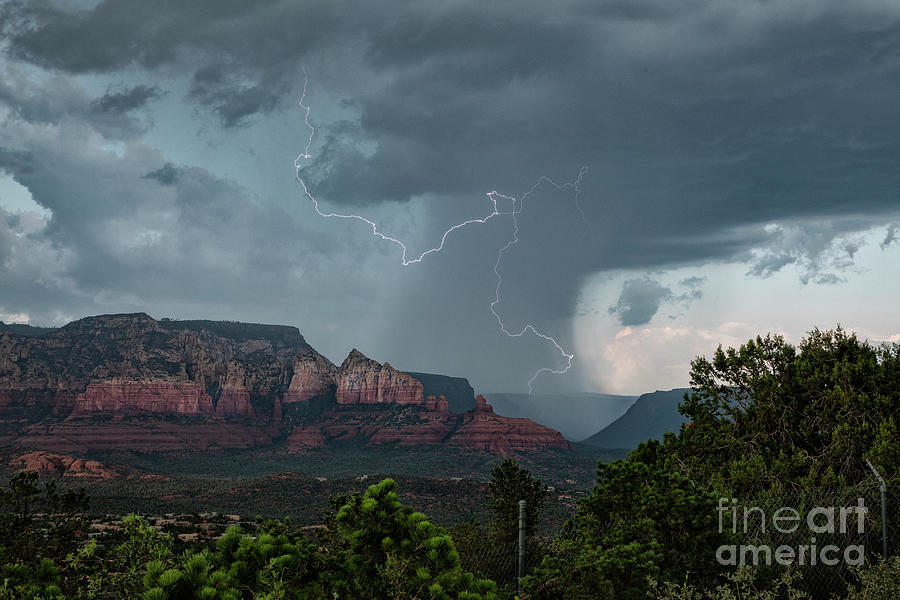 Lightning Over Red Rock by Roger Hill / Science Photo Library
