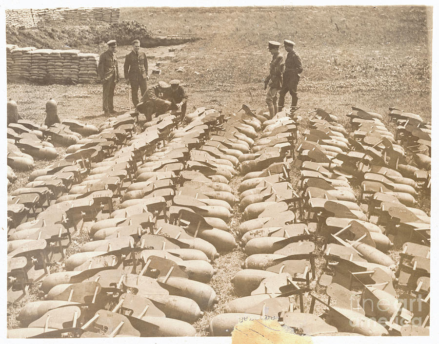Officers Inspecting Aerial Bombs by Bettmann