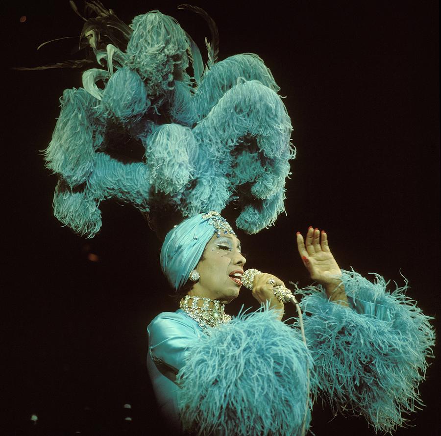 Performer in Extravagant Blue Costume Photograph - Photo Of Josephine Baker by David Redfern