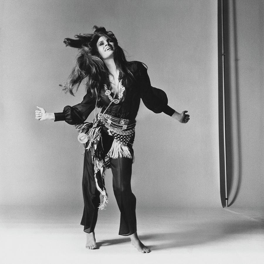 Raquel Welch in Dance Pose Photograph - Raquel Welch Dancing by Bert Stern