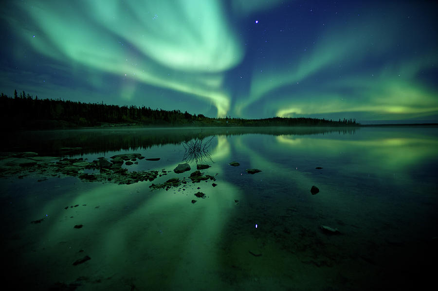 Reflected Northern Lights On Clear Water by Steve Schwarz