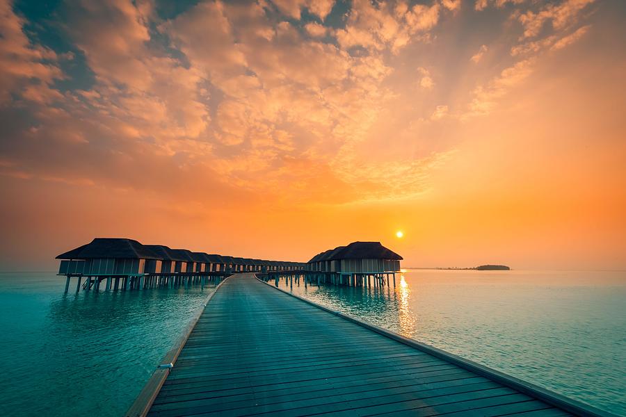 https://images.imagerenderer.com/images/artworkimages/mediumlarge/2/sunset-on-maldives-island-luxury-water-levente-bodo.jpg