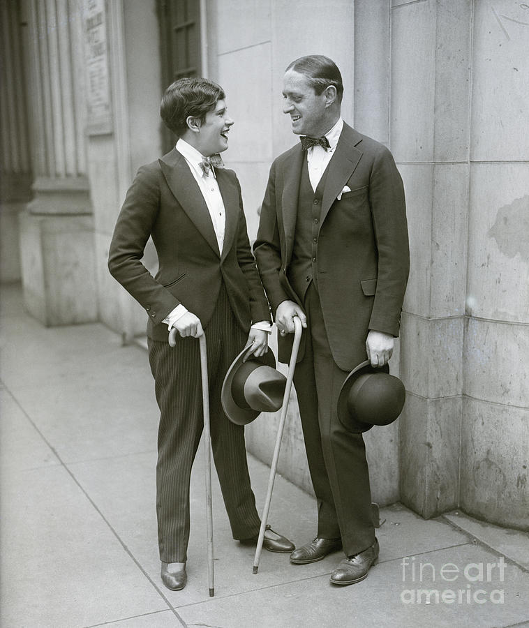 Woman Dressed Like Man Talks To Man by Bettmann