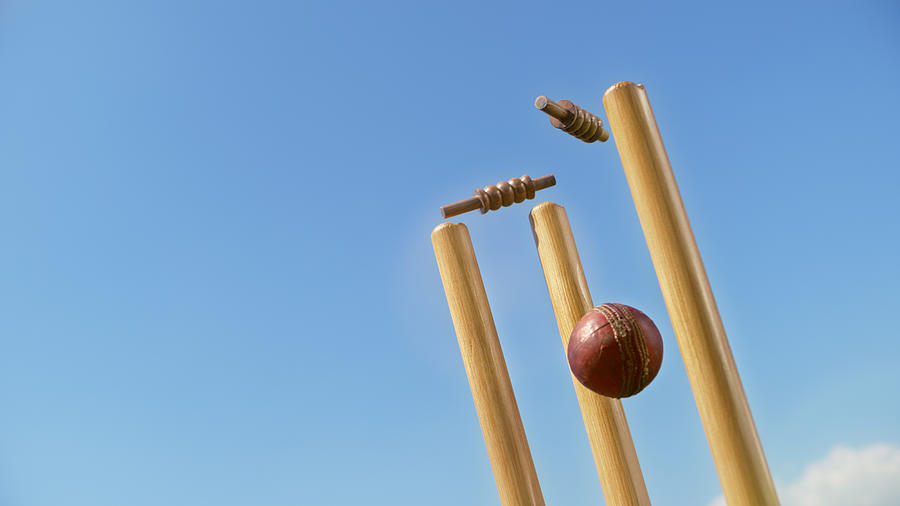 Cricket ball hitting the stumps #1 Photograph by Simonkr