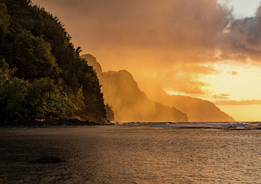 Sunset over the receding mountains of the Na Pali coast of Kauai #1 Photograph by Steven Heap