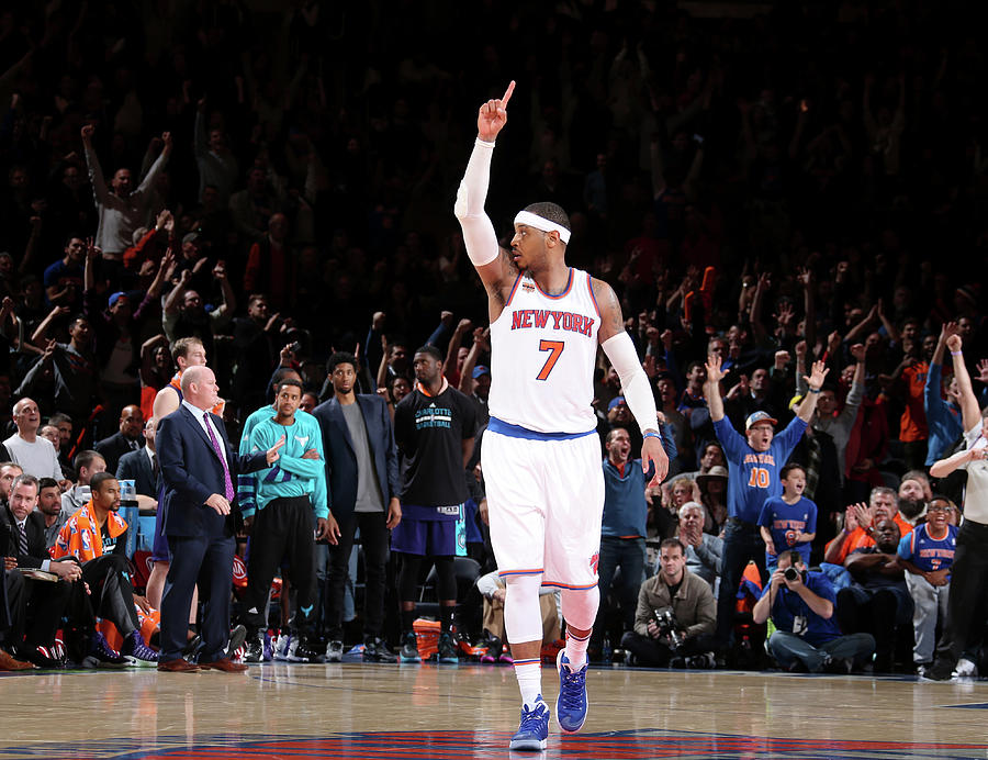 Carmelo Anthony celebrating in front of New York Knicks fans at Madison Square Garden