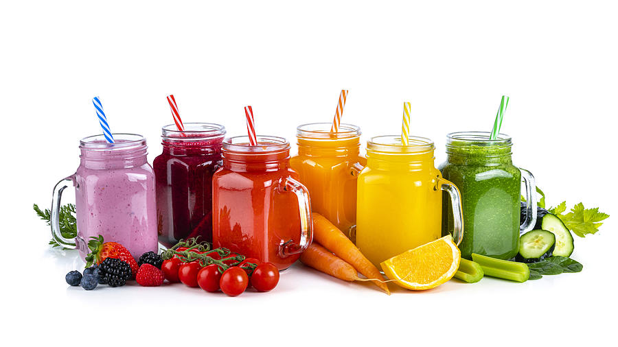 Healthy rainbow colored fruits and vegetables smoothies isolated on white background #3 Photograph by Fcafotodigital