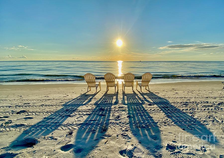 4 Chair Sunset Photograph by Donn Ingemie