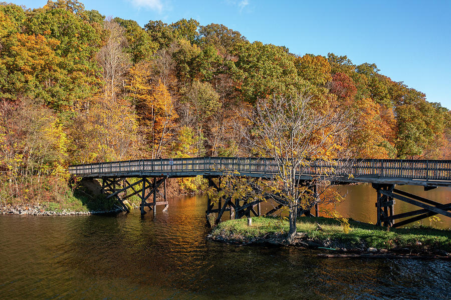 Fall colors surround the lake and trail at Cheat Lake Park #6 Photograph by Steven Heap