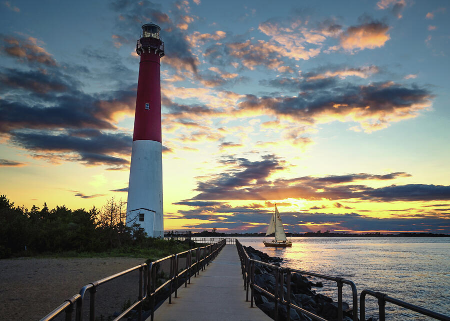 Sunset at the Lighthouse Photograph - Barnegat Sails by Steven Nelson