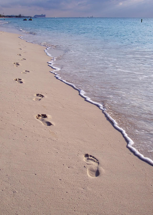 Beach Sand Caribbean Footprints Dissappearing Into Brilliant Blue Ocean Water Photograph by Travelpixpro