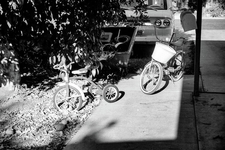 Vintage Bicycles on Sunny Street Photograph - Bicycles on Sunny Day by Jeremy Butler