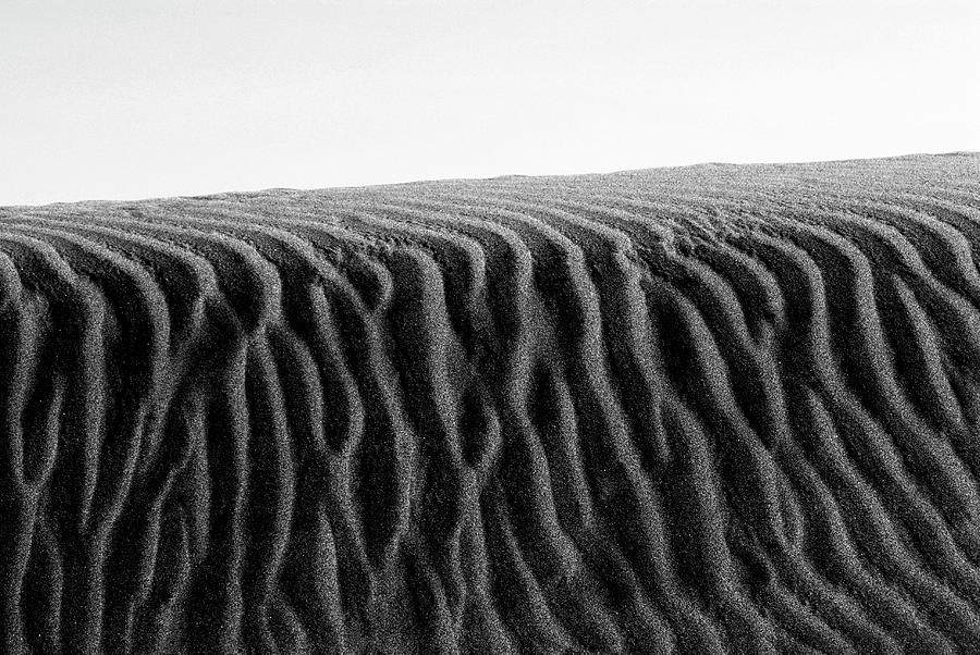 Black stripped wavy abstract background Photograph by Severija Kirilovaite