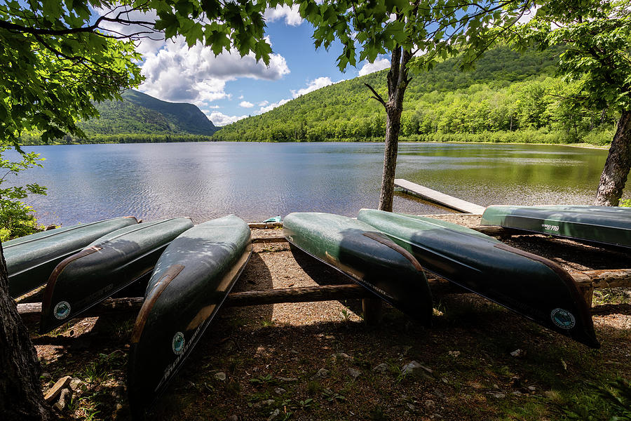 Canoes on the Shoreline Photograph by Craig A Walker