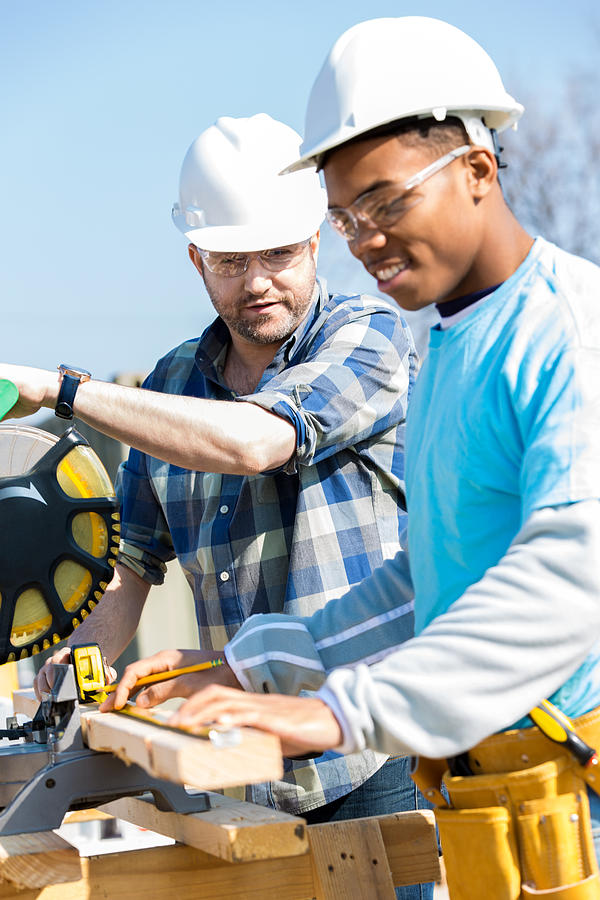 Construction Workers Use Saw At Job Jite Sdi Productions