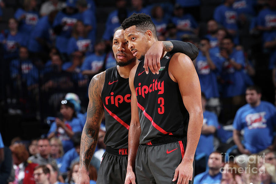 Basketball Players in Intense Discussion Photograph - Damian Lillard and C.j. Mccollum by Joe Murphy