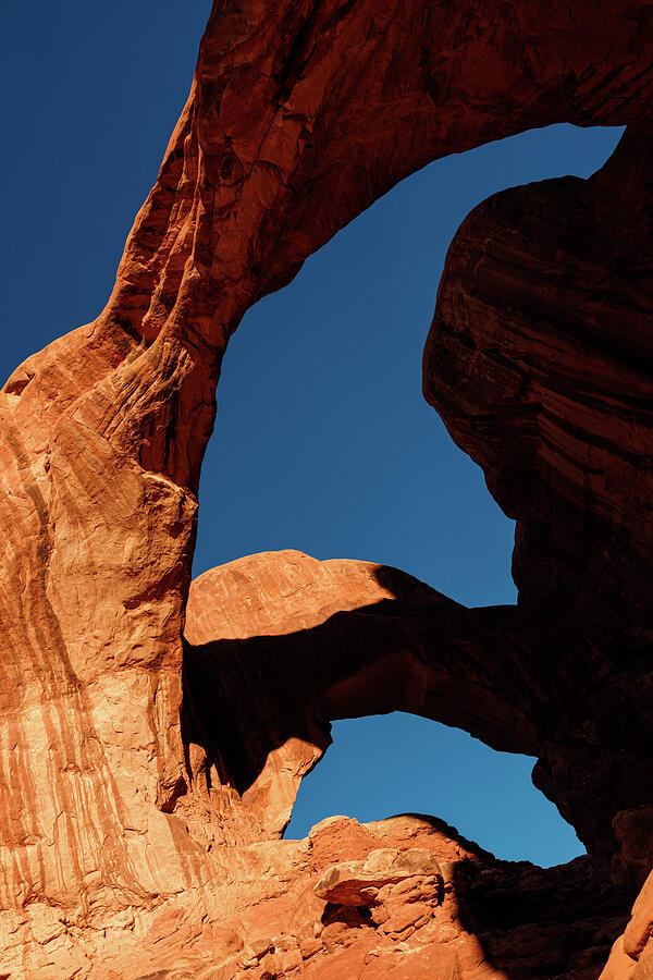 Spectacular Rock Formations at Sunset Photograph - Double Arch Sentinel, Arches National Park Red Rock Formations and Deep Blue Sky by Robert Niemeier