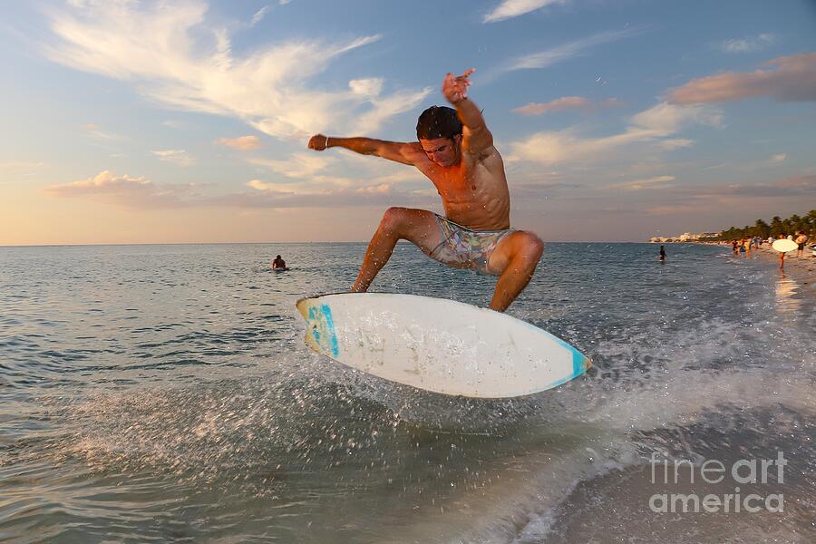 Dynamic Skimboarding at Sunset Photograph - Dynamic Skimboarding at Sunset by Donn Ingemie