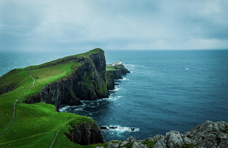 Lighthouse on a Rocky Cliff Photograph - Edge of the World by Kevin Schwalbe