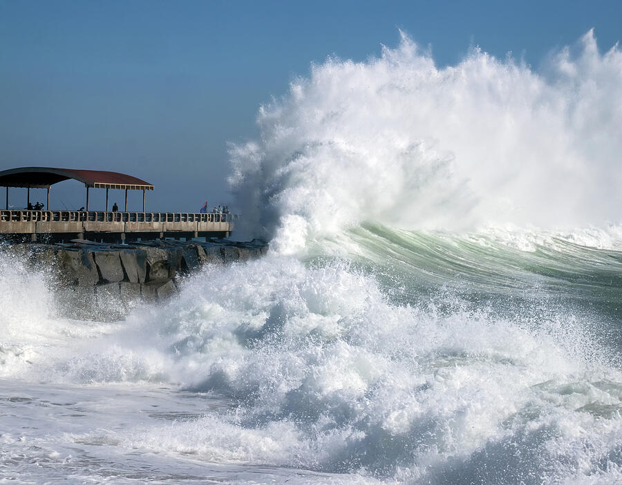 Fine Morning for a Stroll on the Breakwater Photograph by Joe Schofield