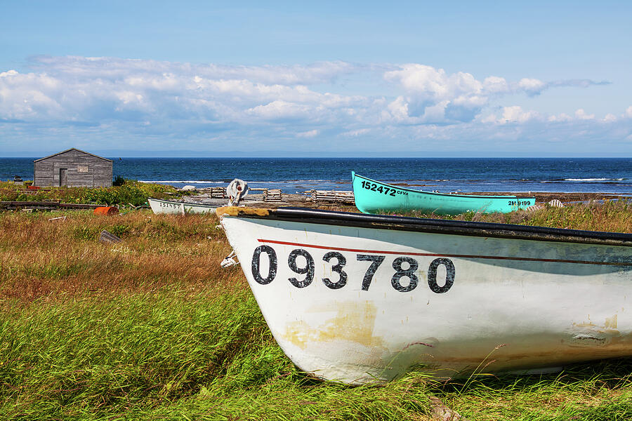 Boats Resting Near the Ocean Photograph - Fishing Boats on a Sunny Shoreline - Newfoundland, Canada by Tatiana Travelways