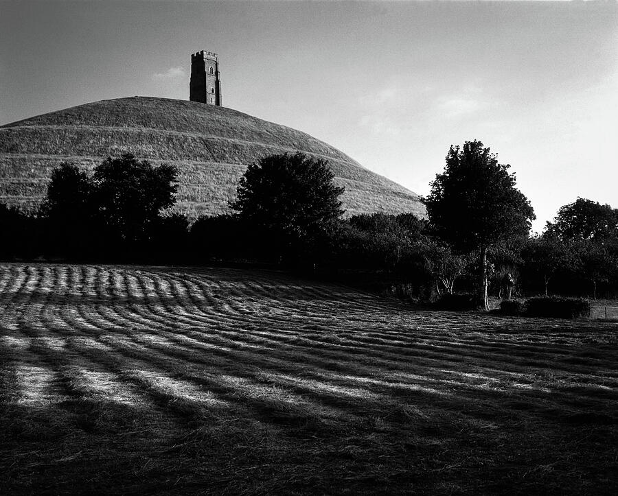 Ancient Tower on a Hill Photograph - Glastonbury Tor, harvest time by Seeables Visual Arts