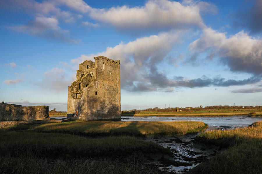 Medieval Castle Ruins at Sunset Photograph - Golden Light on Carrigafoyle Castle by Mark Callanan