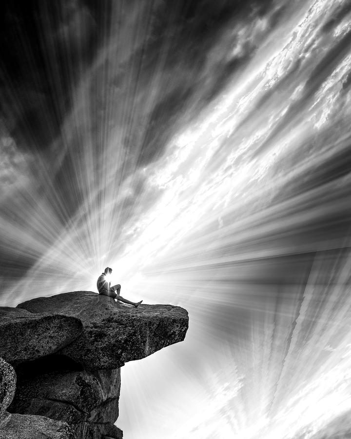 Person on a Rocky Cliff Photograph - Guided by the light by Sofie Conte