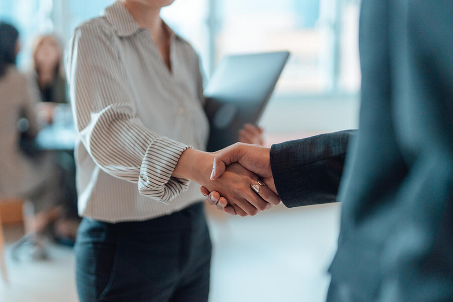 Handshake For Successful Partnership And Business Agreement Oscar Wong