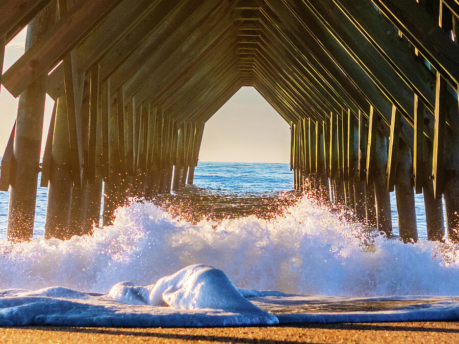 High tide under the pier Photograph by Oceanic SkyView