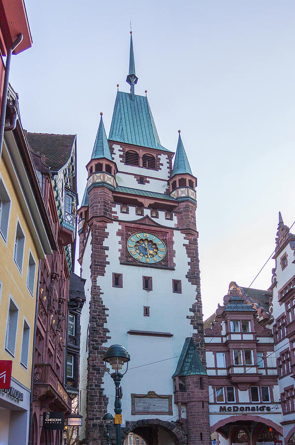 Historic Clock Tower in Cityscape Photograph - Historic Clock Tower in Freiburg, Germany by Tatiana Travelways