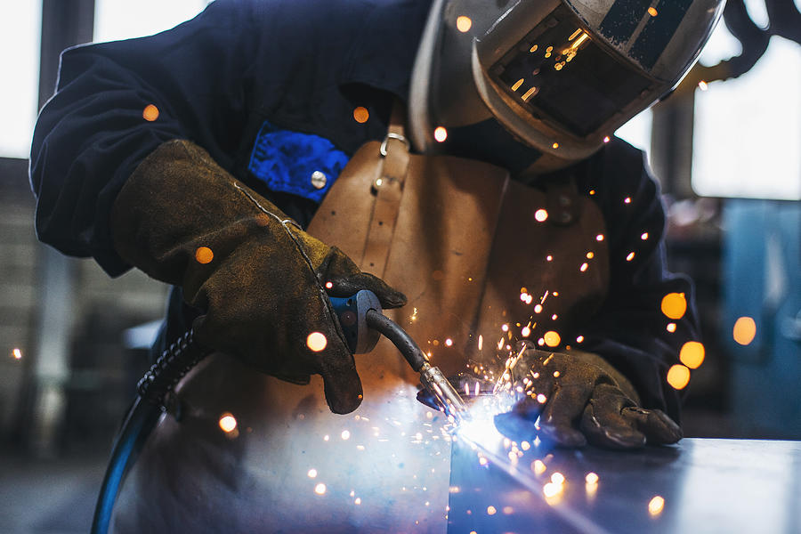 Industrial Welder With Torch Photograph by Obradovic