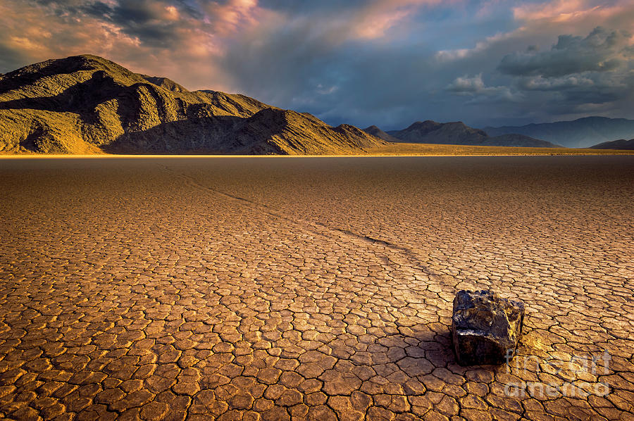 Last light on the Grandstand, Racetrack Playa, Death Valley, California Photograph by Neale And Judith Clark
