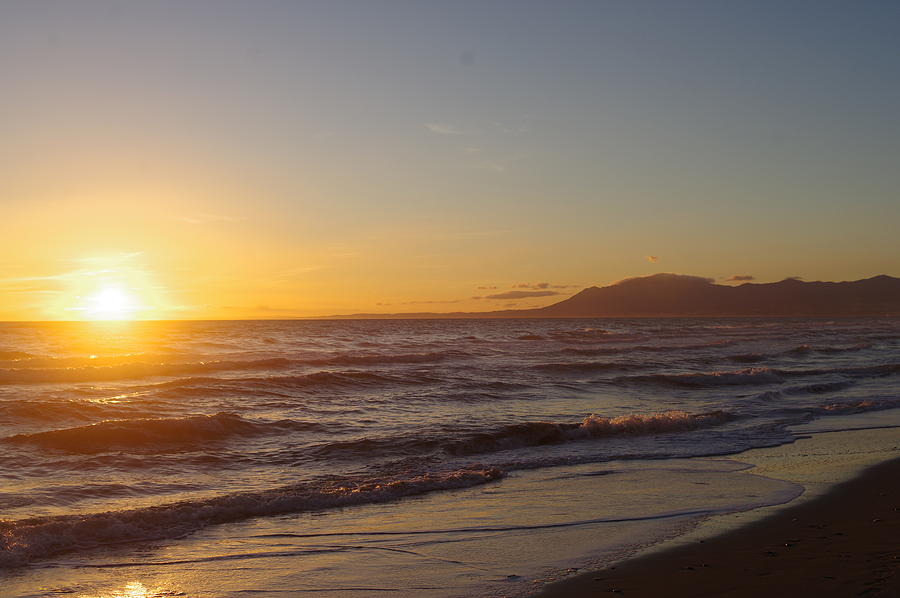 Marbella Sunset with waves Photograph by Murray Croft