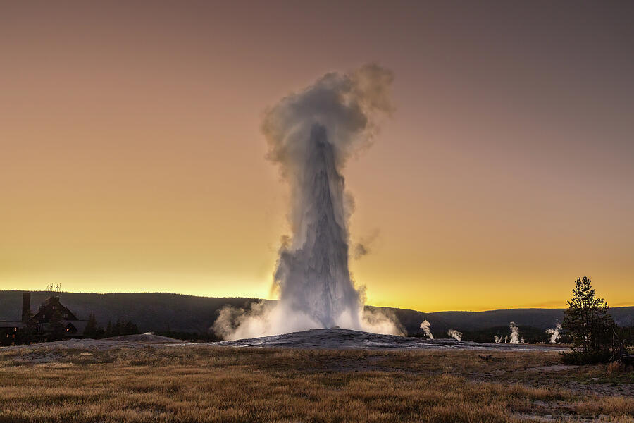 Old Faithful Sunset Photograph by Tim Lyden