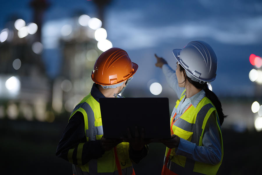 Operations And Maintenance Service In Field Support For Energy Generation Rear View Of Field Support Engineers Working In A Power Plant To Diagnose And Enhanced Plant Performance During On Site Service Nitat Termmee