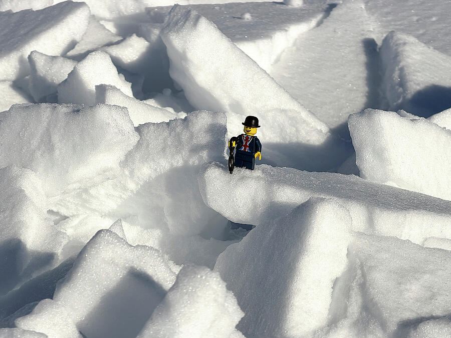 Toy Adventurer in Snowy Landscape Photograph - Our Man in Nuuk - 3 by Richard Reeve