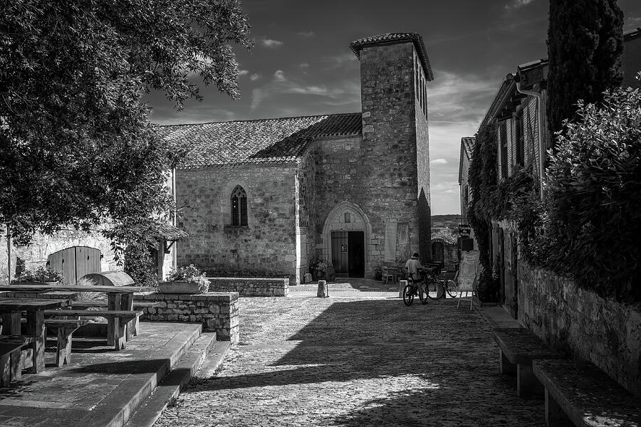 Stone Church in Sunlit Courtyard Photograph - Pujols by Seeables Visual Arts