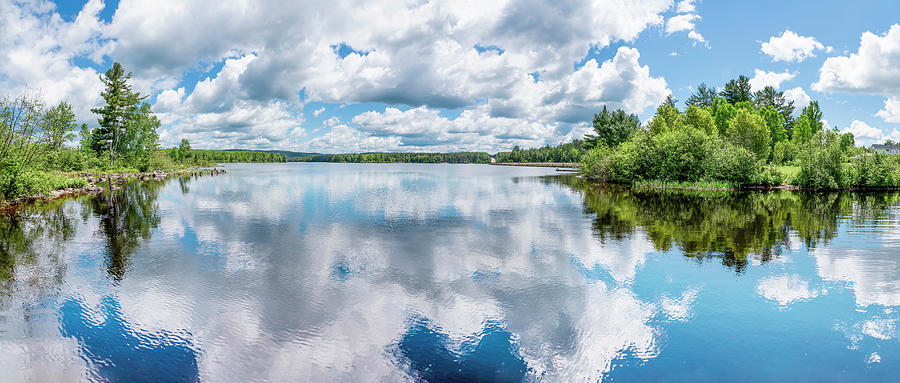 Reflections in the Ottawa River Photograph by John Twynam