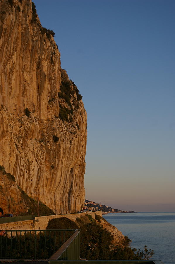 Rock face on Ave Trois Septembre Photograph by Murray Croft