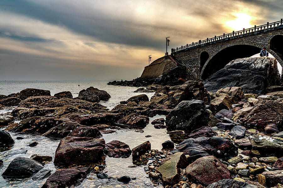 Rugged Rocks and Smooth Water on the Yellow Sea Photograph by Anthony Hightower