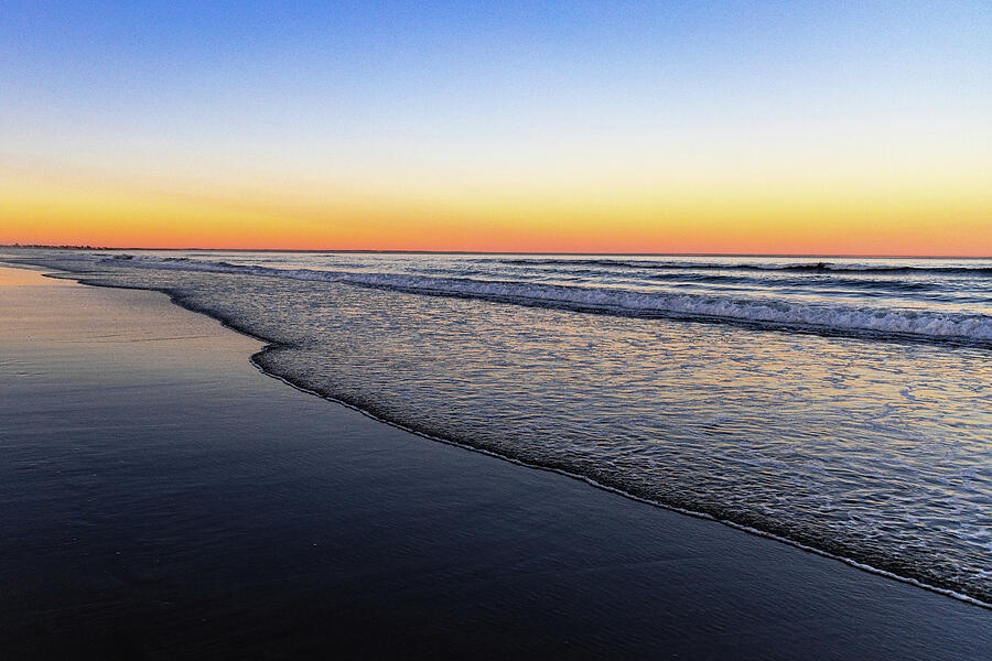 Serene Beach Sunset with Gentle Waves Photograph by NorthEast Creativity